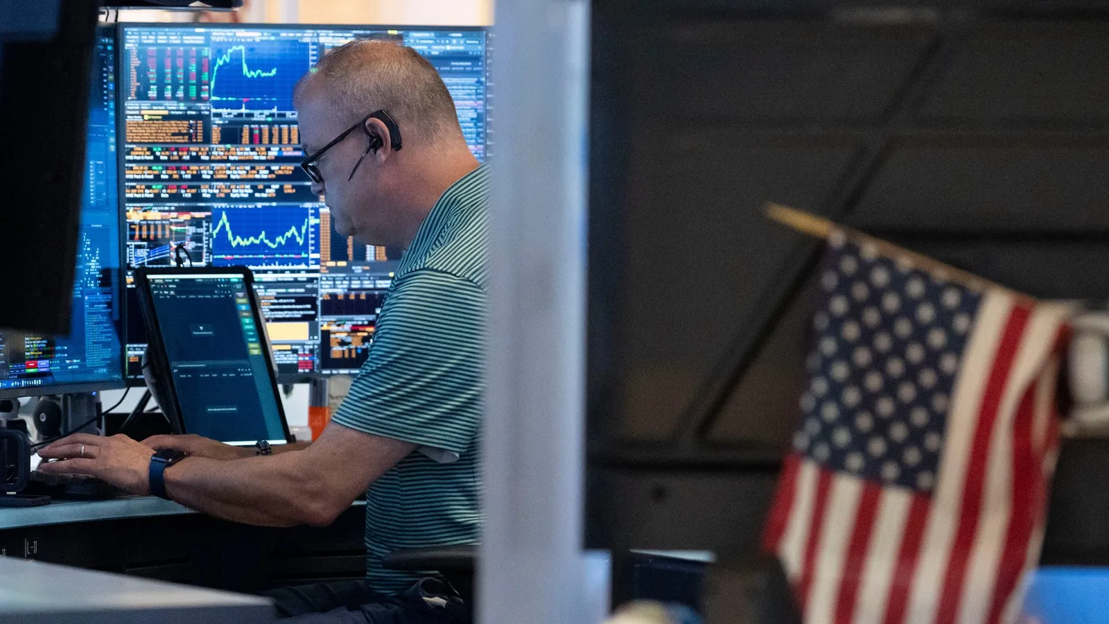 Nasdaq drops 2.3% as tech stocks slide after earnings reports revive AI bubble fears